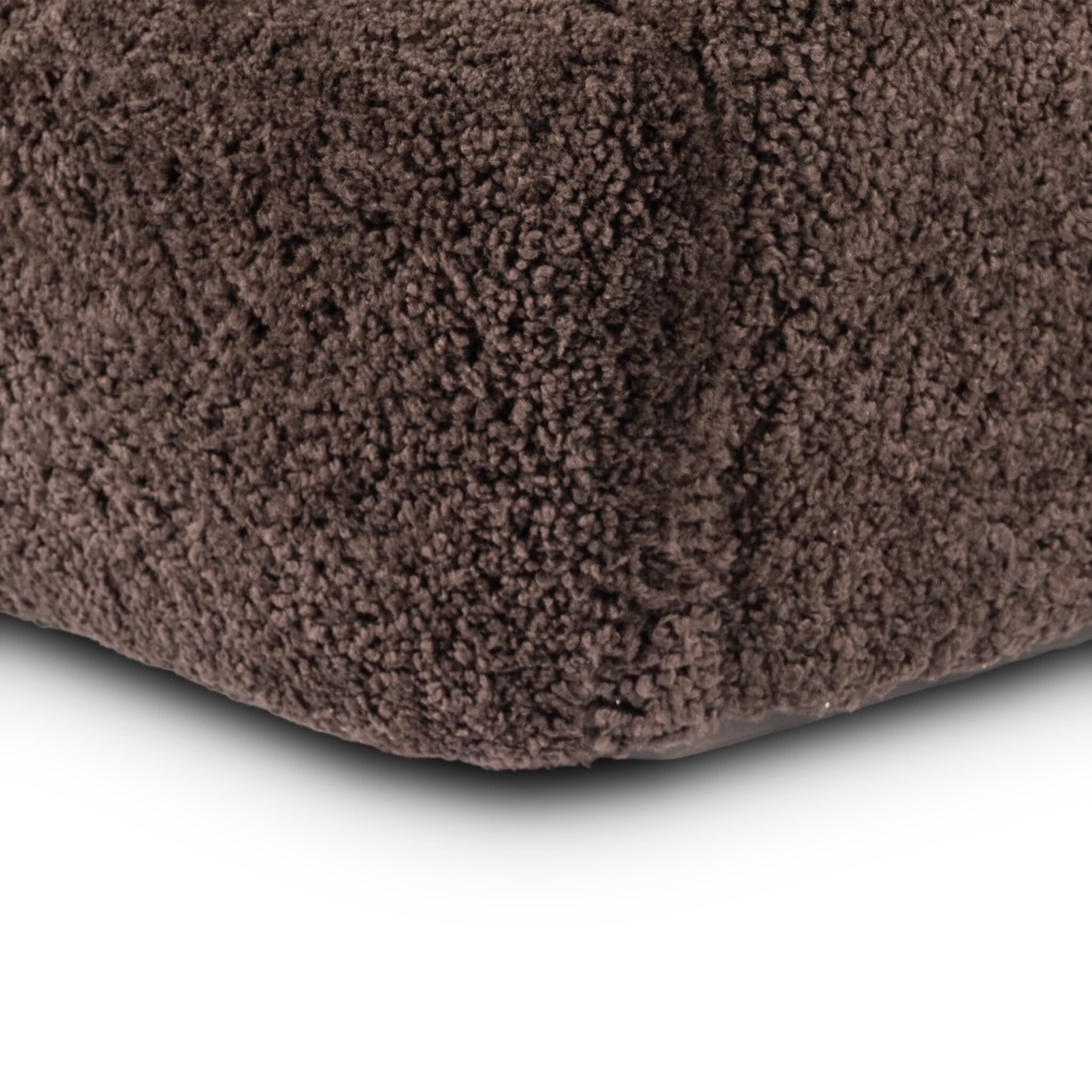 Close up of Four Hands Julius Swivel Chair in Cocoa Shearling on a white background at Addison West