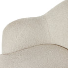 Close up of Four Hands Julius Swivel Chair in Sheldon Ivory on a white background at Addison West