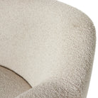 Close up of Four Hands Julius Swivel Chair in Sheldon Ivory on a white background at Addison West