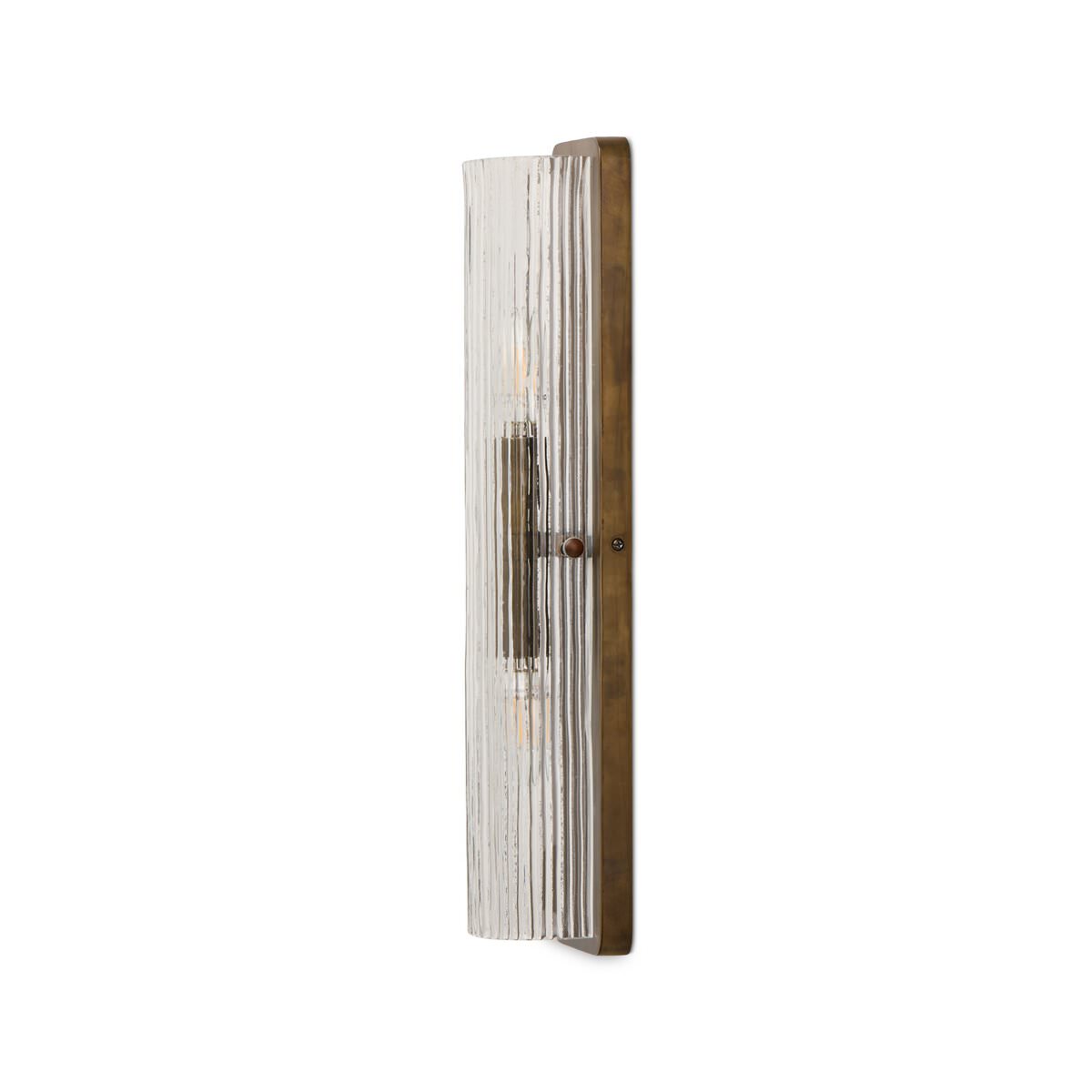 Four Hands Kenji Sconce in Clear Reeded Glass on a white background at Addison West