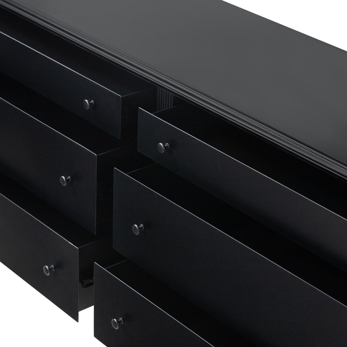 Close up of drawers of Four Hands Lendon 6 Drawer Dresser in Black on a white background