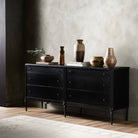 Four Hands Lendon 6 Drawer Dresser in Black in a modern room with dark walls