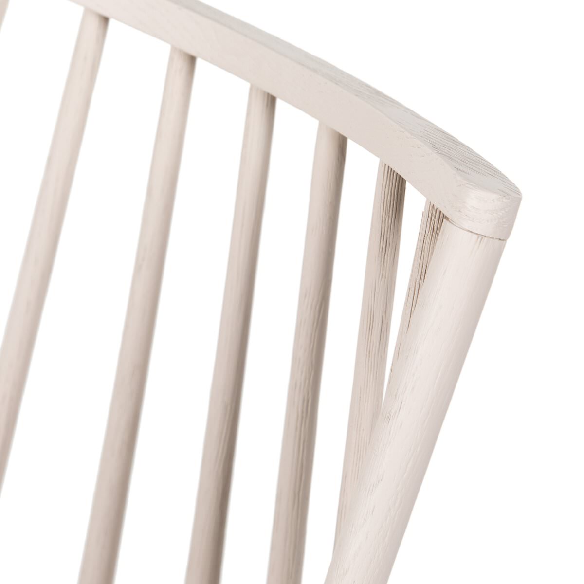 Close up of Four Hands Lewis Windsor Chair in Off White Whiskey Saddle on a white background