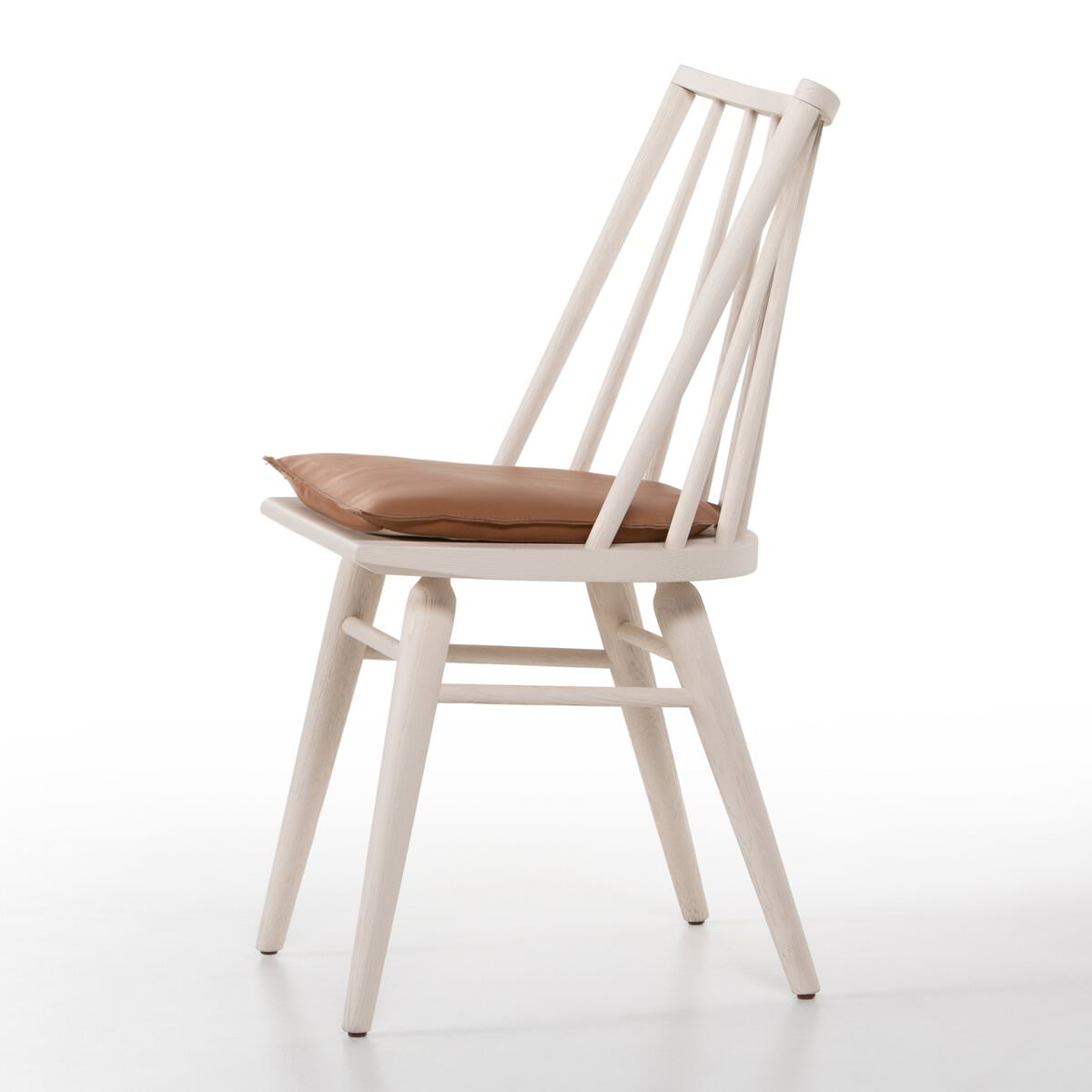 Four Hands Lewis Windsor Chair in Off White Whiskey Saddle on a white background