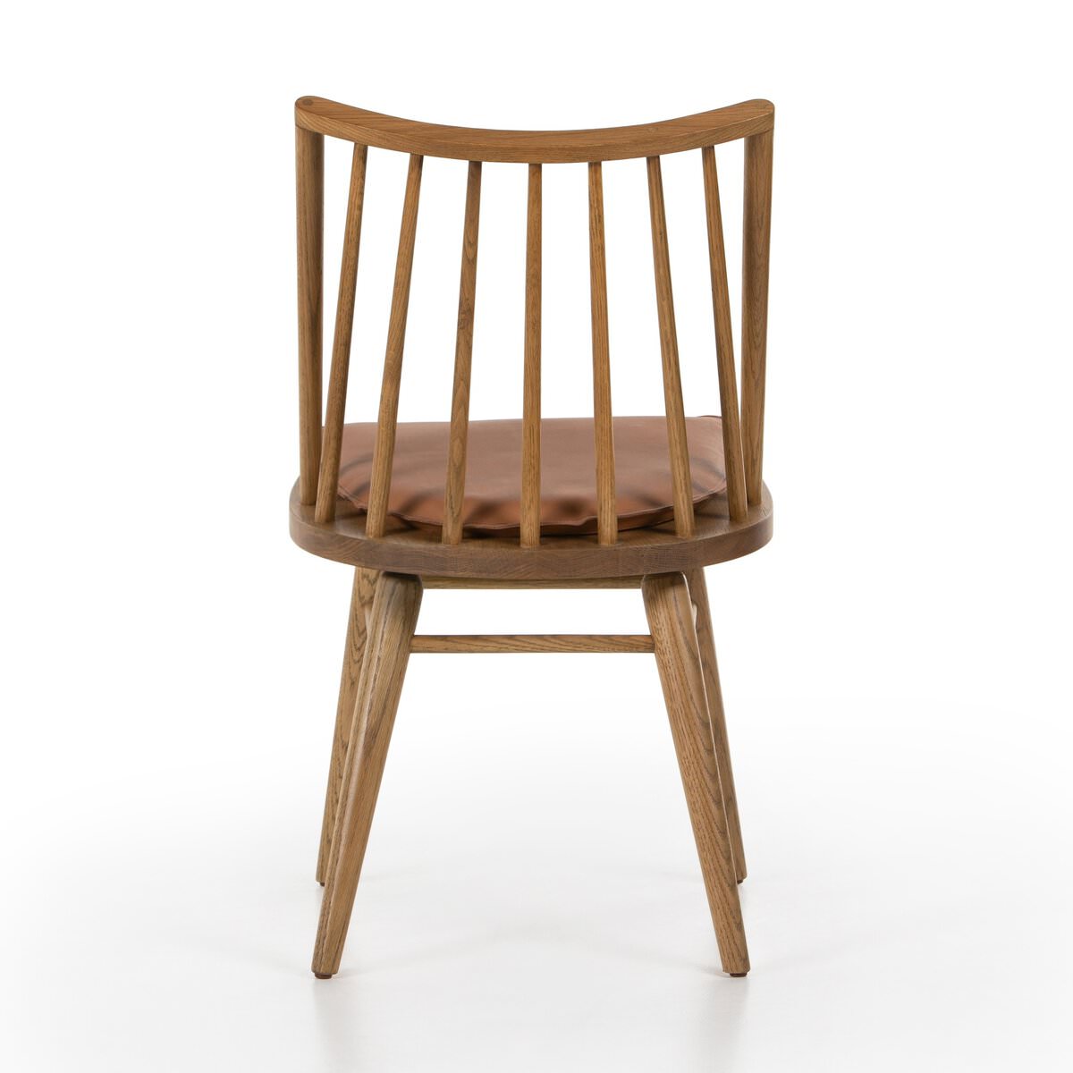 Four Hands Lewis Windsor Chair in Sandy Oak Whiskey Saddle on a white background