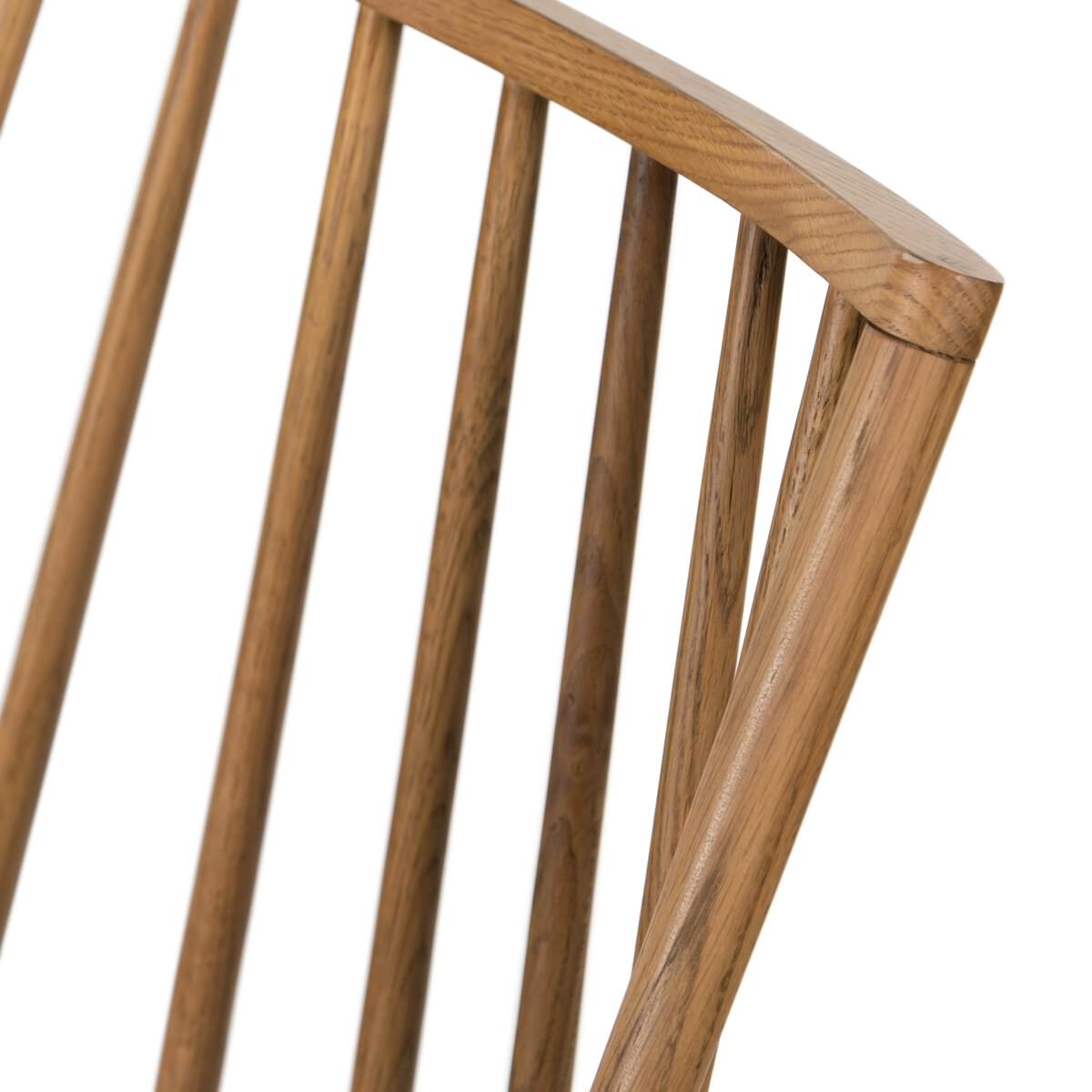 Four Hands Lewis Windsor Chair in Sandy Oak Whiskey Saddle on a white background