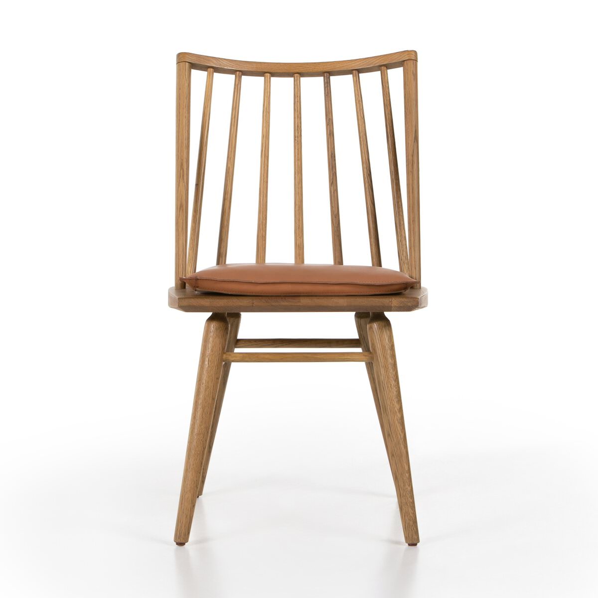 Four Hands Lewis Windsor Chair in Sandy Oak Whiskey Saddle on a white background