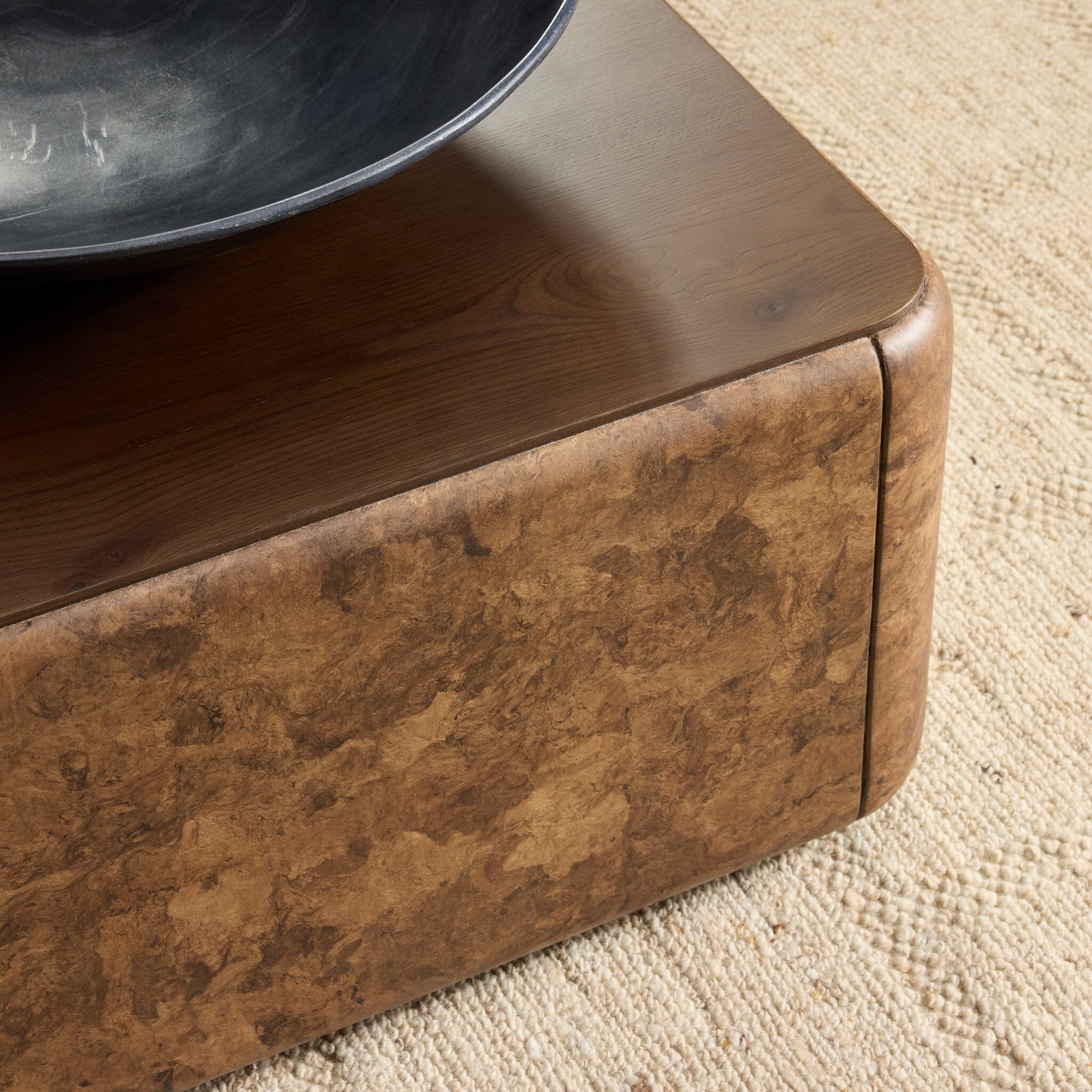 Four Hands Lola Coffee Table in Umber Oak Veneer in a living room at Addison West
