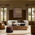 Four Hands Lola Coffee Table in Umber Oak Veneer in a living room at Addison West