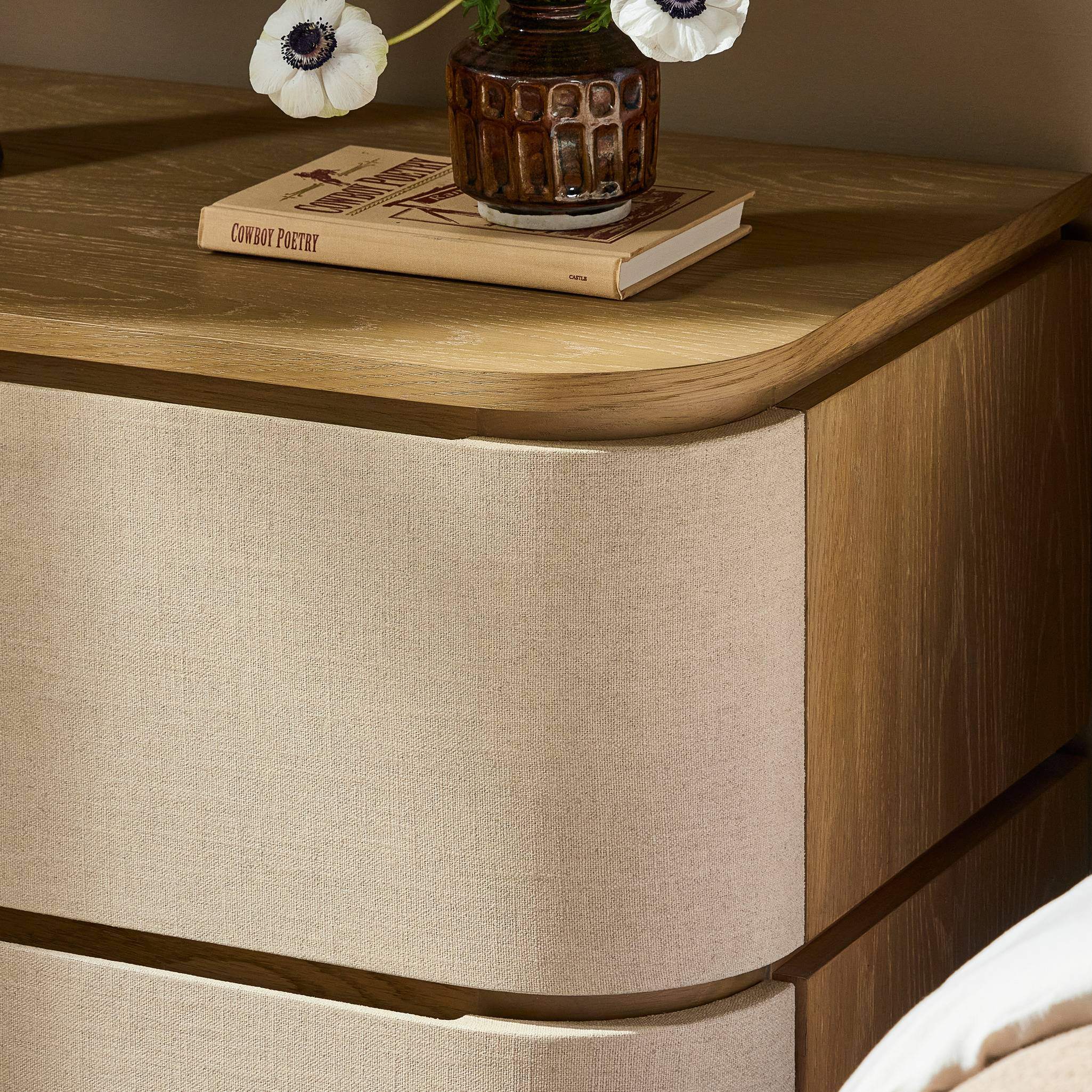 Four Hands Mariella Nightstand in Beige Painted Linen in bedroom at Addison West.