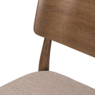 Close up of Four Hands Marley Dining Chair in Alcala Wheat on a white background at Addison West