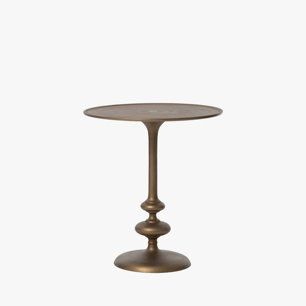 Four Hands Marlow Matchstick Pedestal Table in matte brass on a white background
