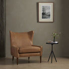 Four Hands Marlow Wing Chair in Palermo Cognac in living room at Addison West.