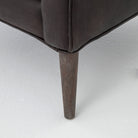 Close up of the Four Hands Marlow Wing Chair in Vintage Black on white background at Addison West.