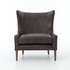 Four Hands Marlow Wing Chair in Vintage Black on white background at Addison West.