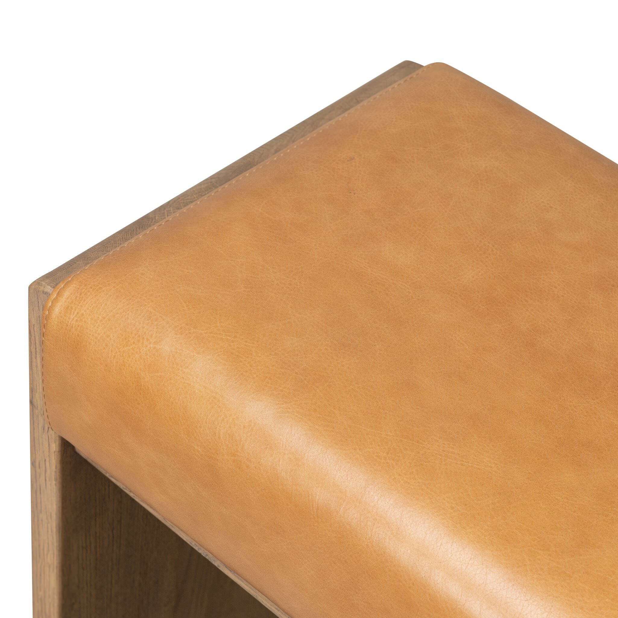 Close up of Four Hands Nash Counter Stool in Sonoma Butterscotch on white background at Addison West.