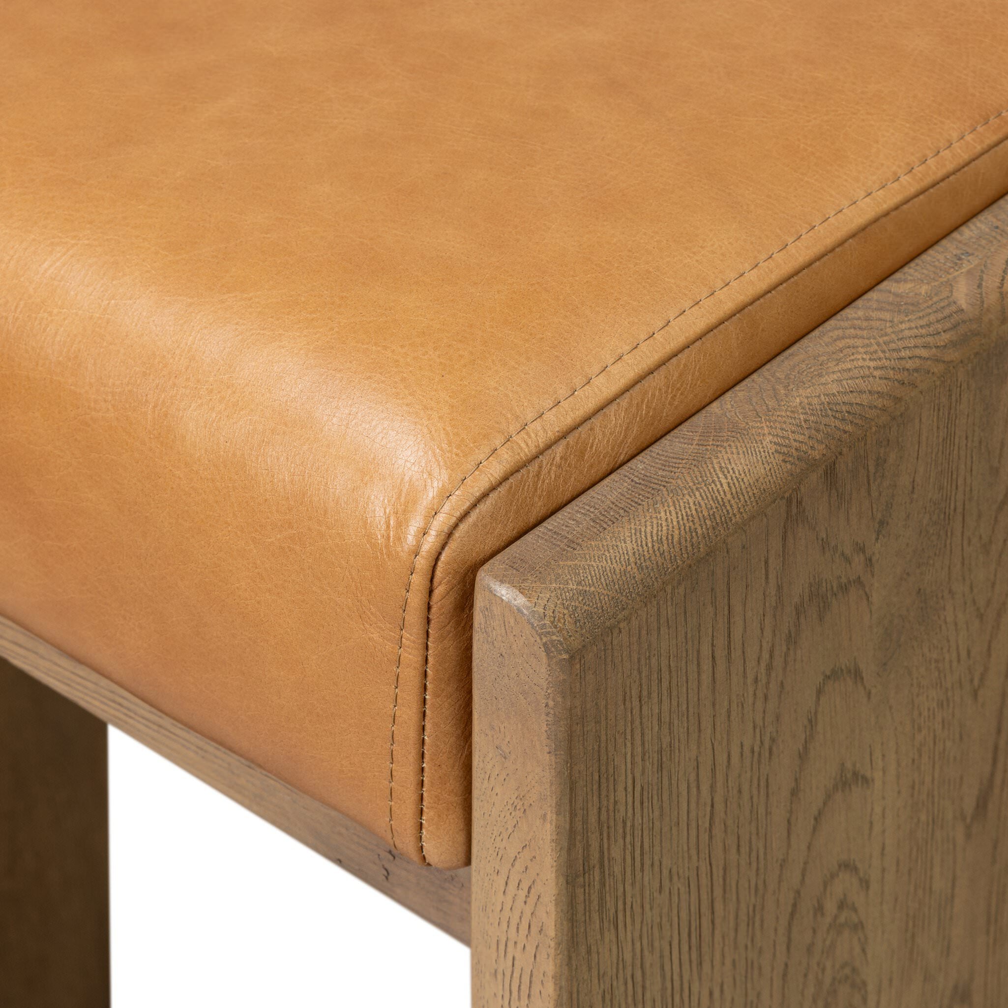 Close up of Four Hands Nash Counter Stool in Sonoma Butterscotch on white background at Addison West.