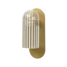 Four Hands Odyssey Sconce in Burnished Brass on a white background at Addison West