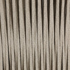 Close up of Four Hands Porto Outdoor Swivel Chair in Alessi Linen at Addison West
