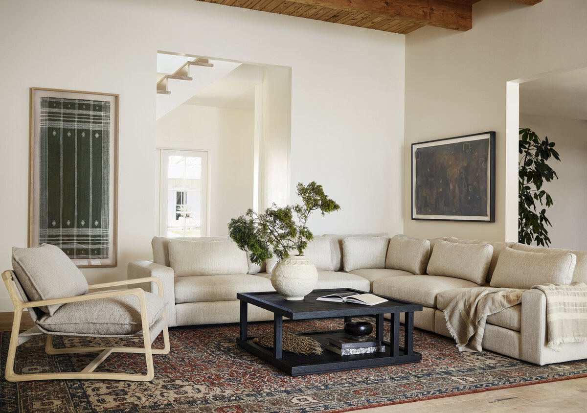 Four Hands Prato Hand Knotted Rug in Prato in a light neutral living room at Addison West