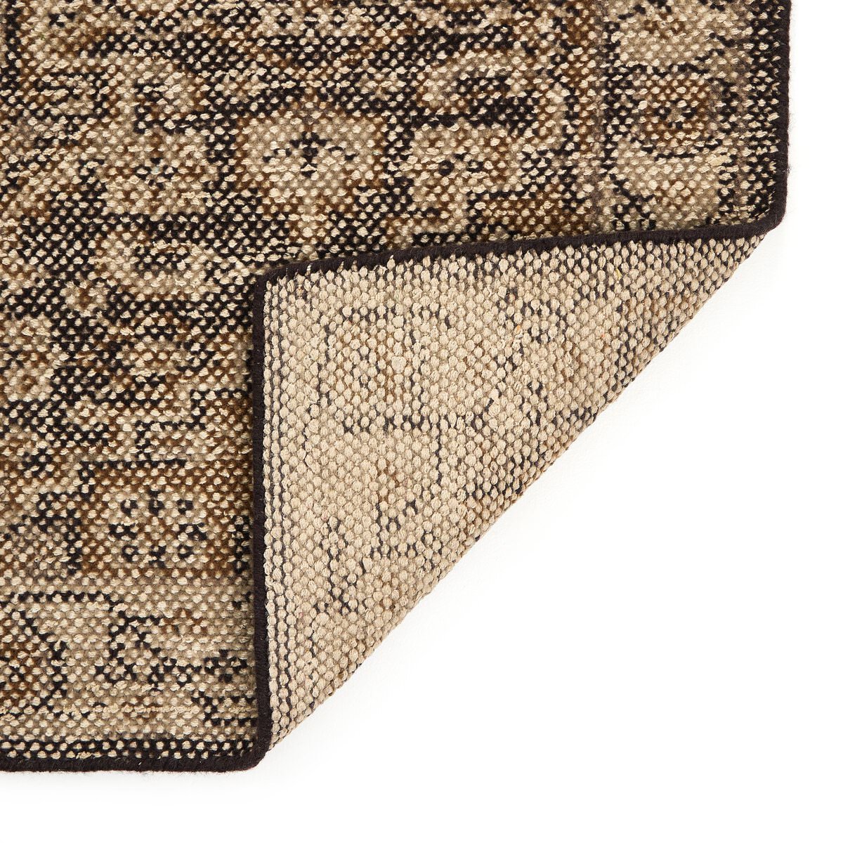 Close up of Four Hands Prato Hand Knotted Rug in Prato Espresso, 3'x9' on a white background at Addison West