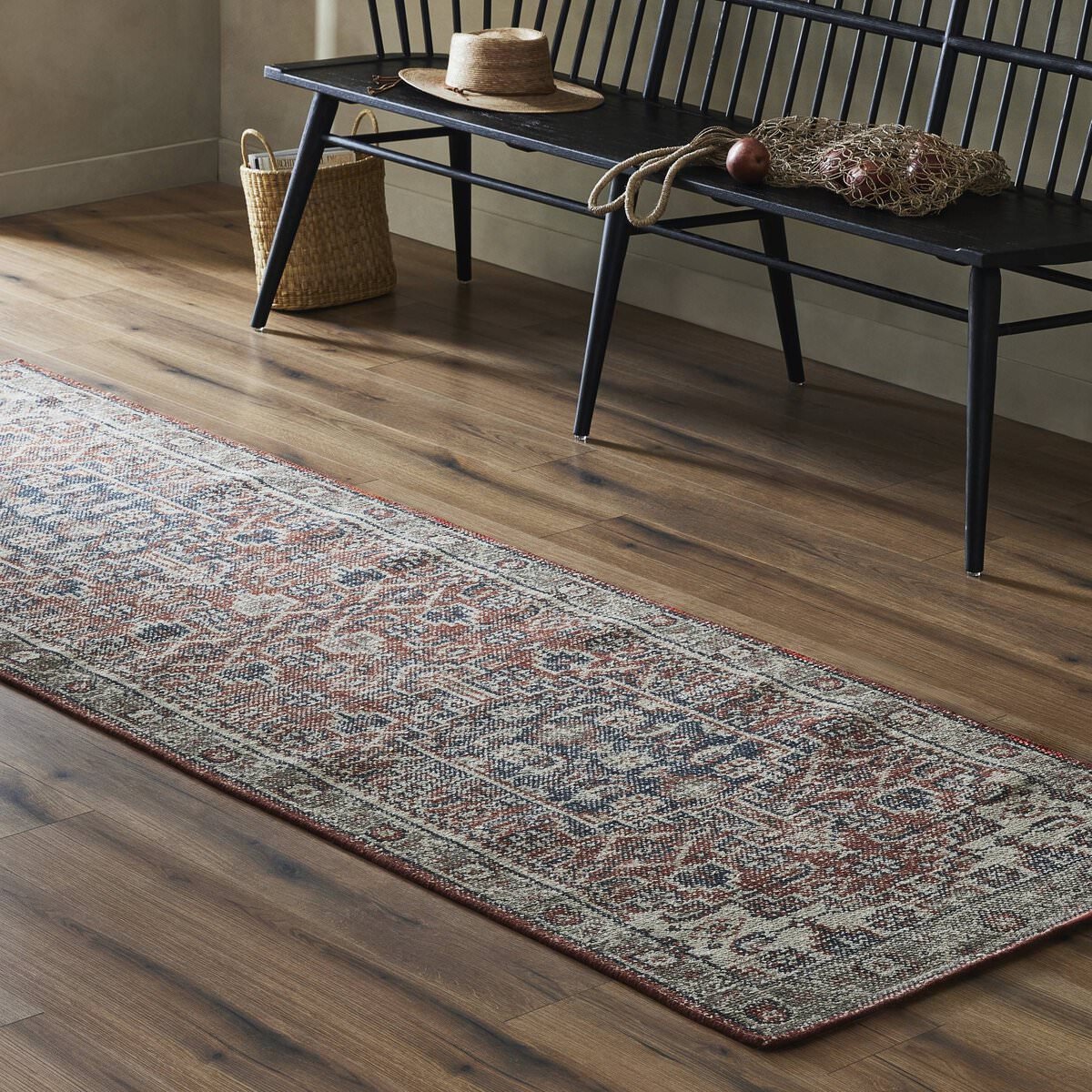 Four Hands Prato Hand Knotted Rug in Prato, 3'x9' in an entryway at Addison West