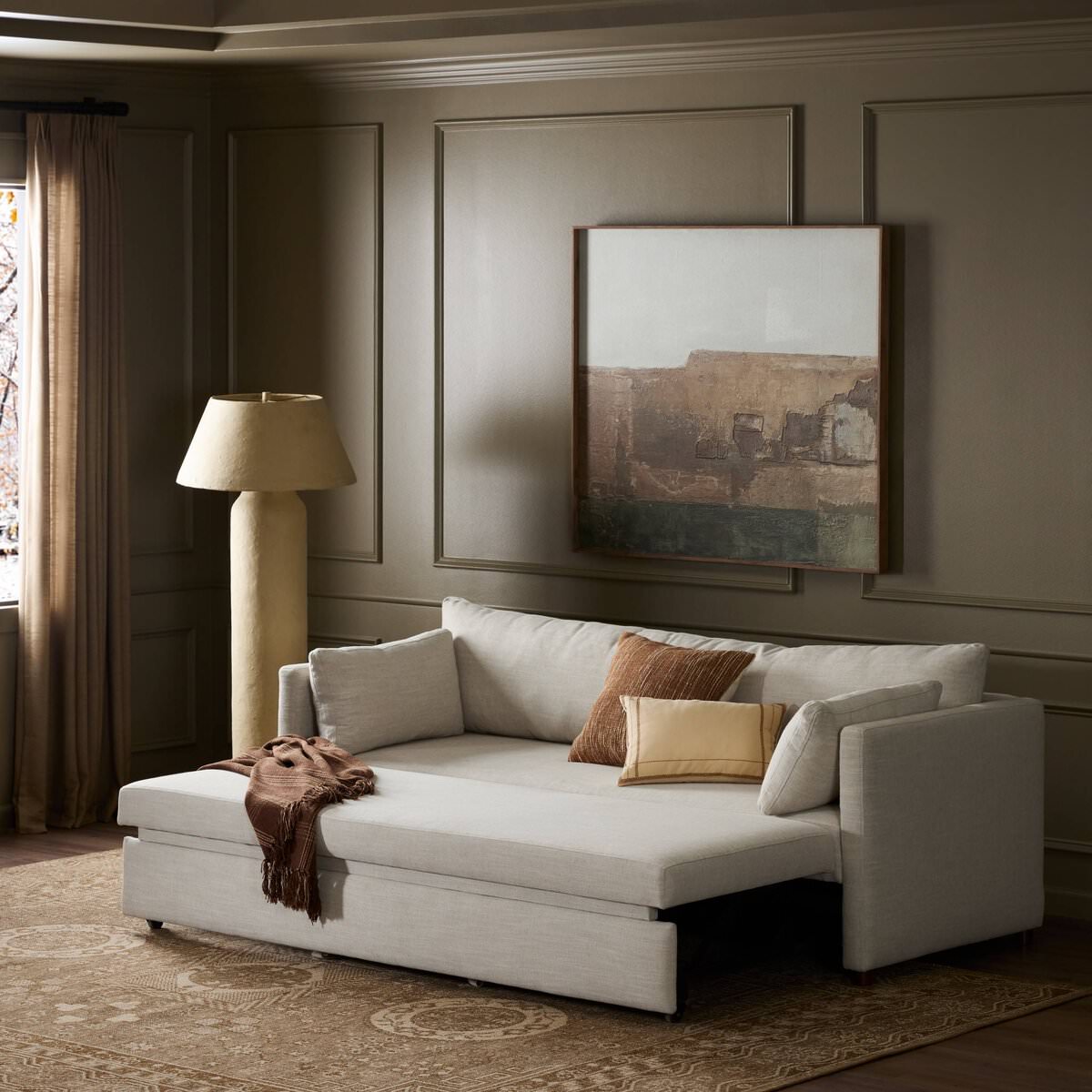 Four Hands Queen Lincoln Sleeper Sofa in Savoy Parchment in a living room at Addison West