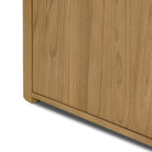 Close up of Four Hands Radius Sideboard in Light Blonde Sungkai Veneer on a white background at Addison West