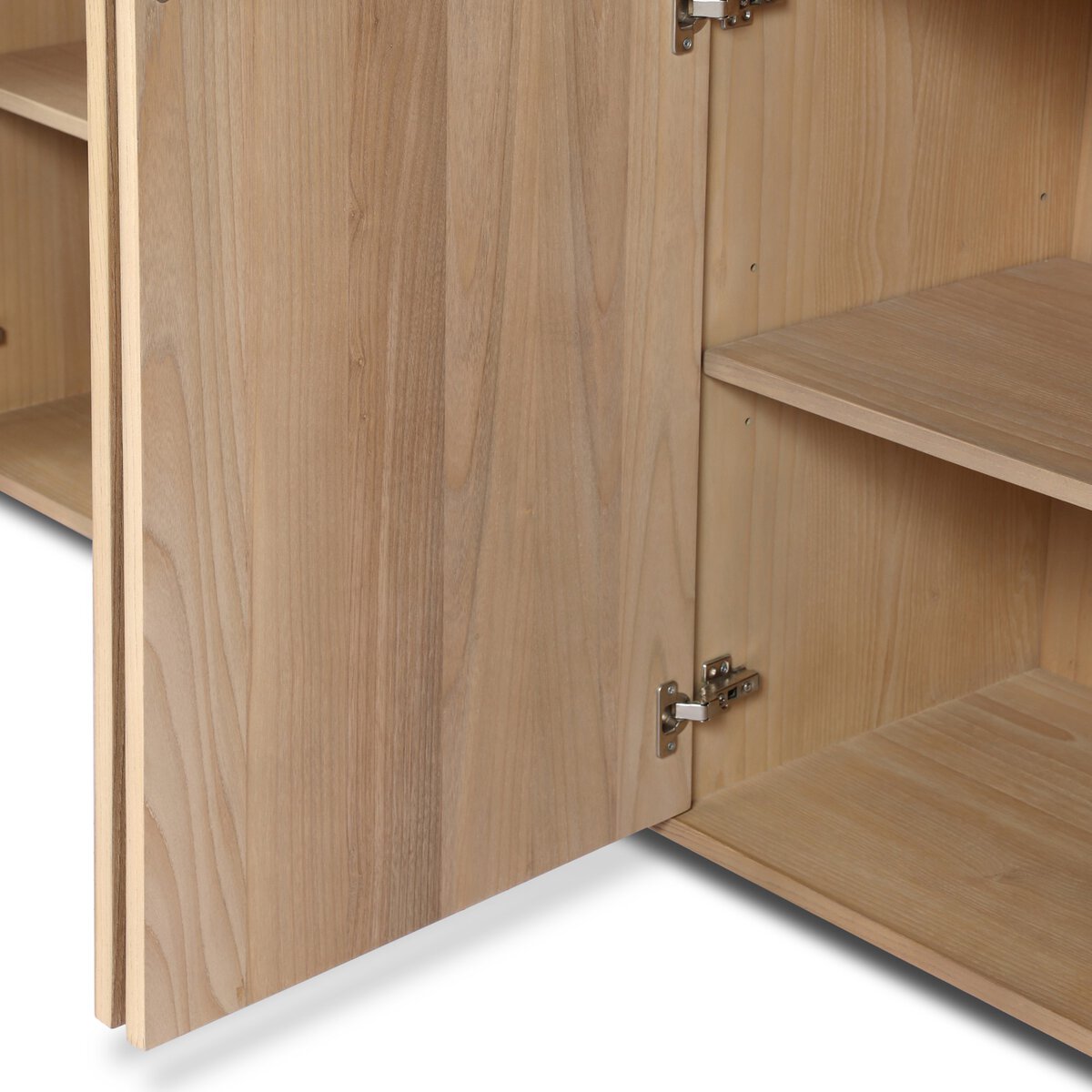 Close up of Four Hands Radius Sideboard in Light Blonde Sungkai Veneer on a white background at Addison West