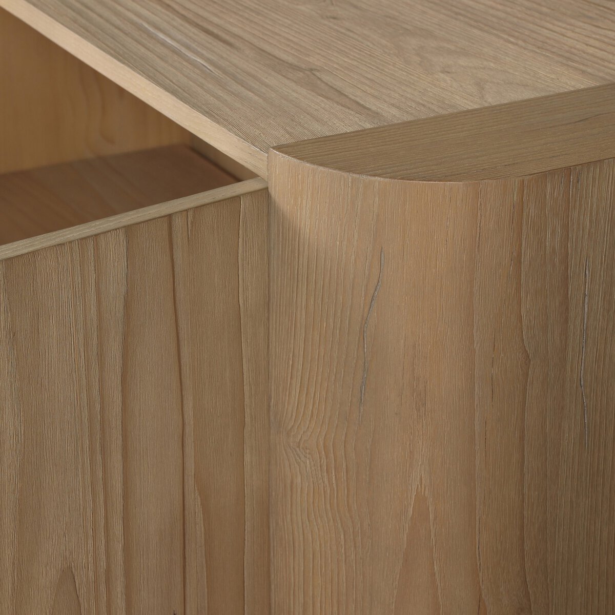 Close up of Four Hands Radius Sideboard in Light Blonde Sungkai Veneer on a white background at Addison West