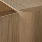 Close up of Four Hands Radius Sideboard in Light Blonde Sungkai Veneer on a white background at Addison West