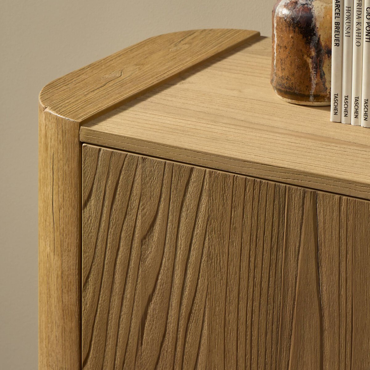 Close up of Four Hands Radius Sideboard in Light Blonde Sungkai Veneer in a living room at Addison West