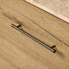 Close up of Four Hands Raleigh 6 Drawer Dresser in Worn Oak Veneer at Addison West