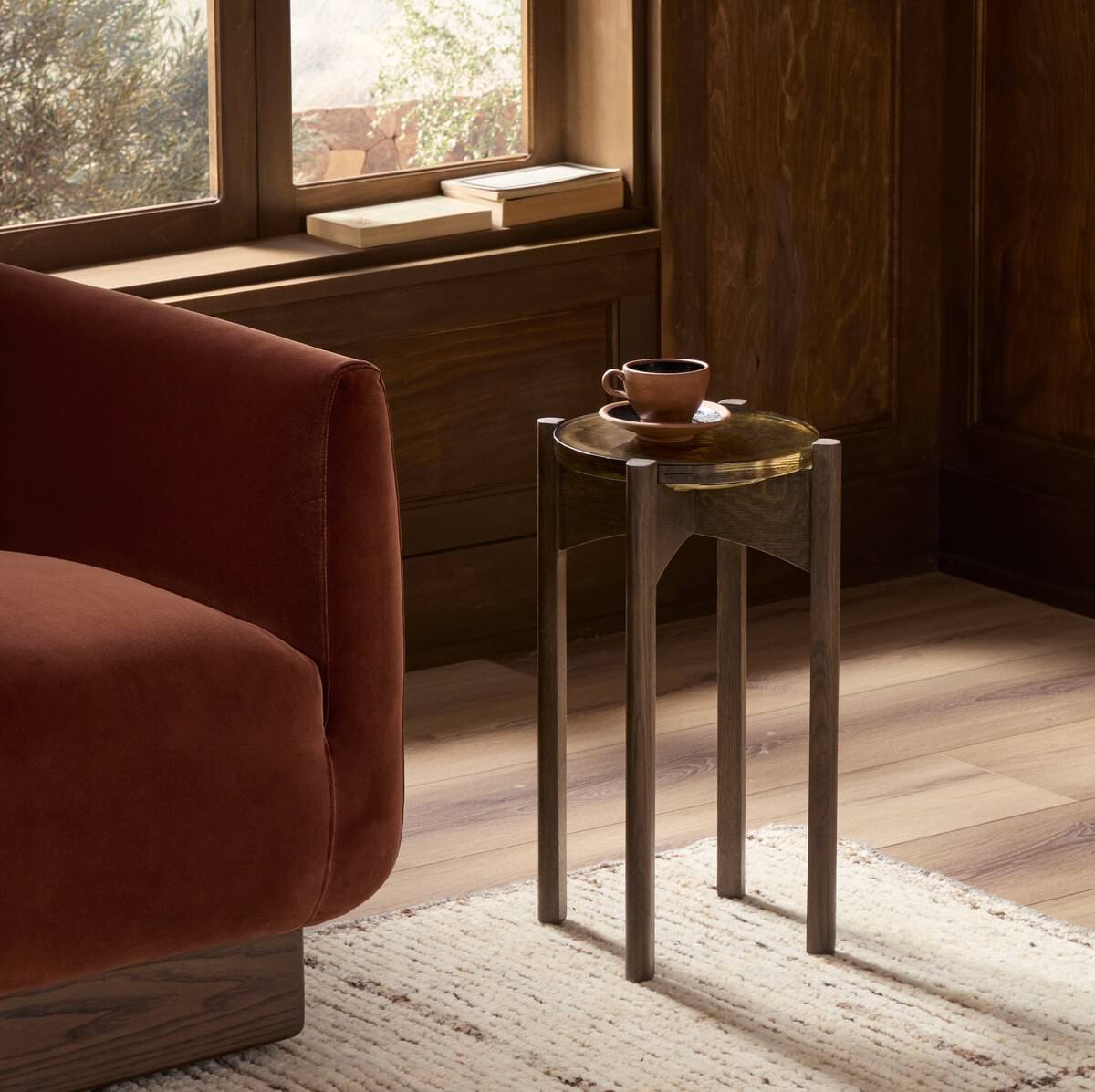 Four Hands Relo End Table in Olive Cast Glass in a living room at Addison West