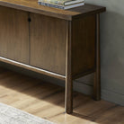 Close up of Four Hands Renaud Sideboard in Dark Toasted Oak in an entryway at Addison West