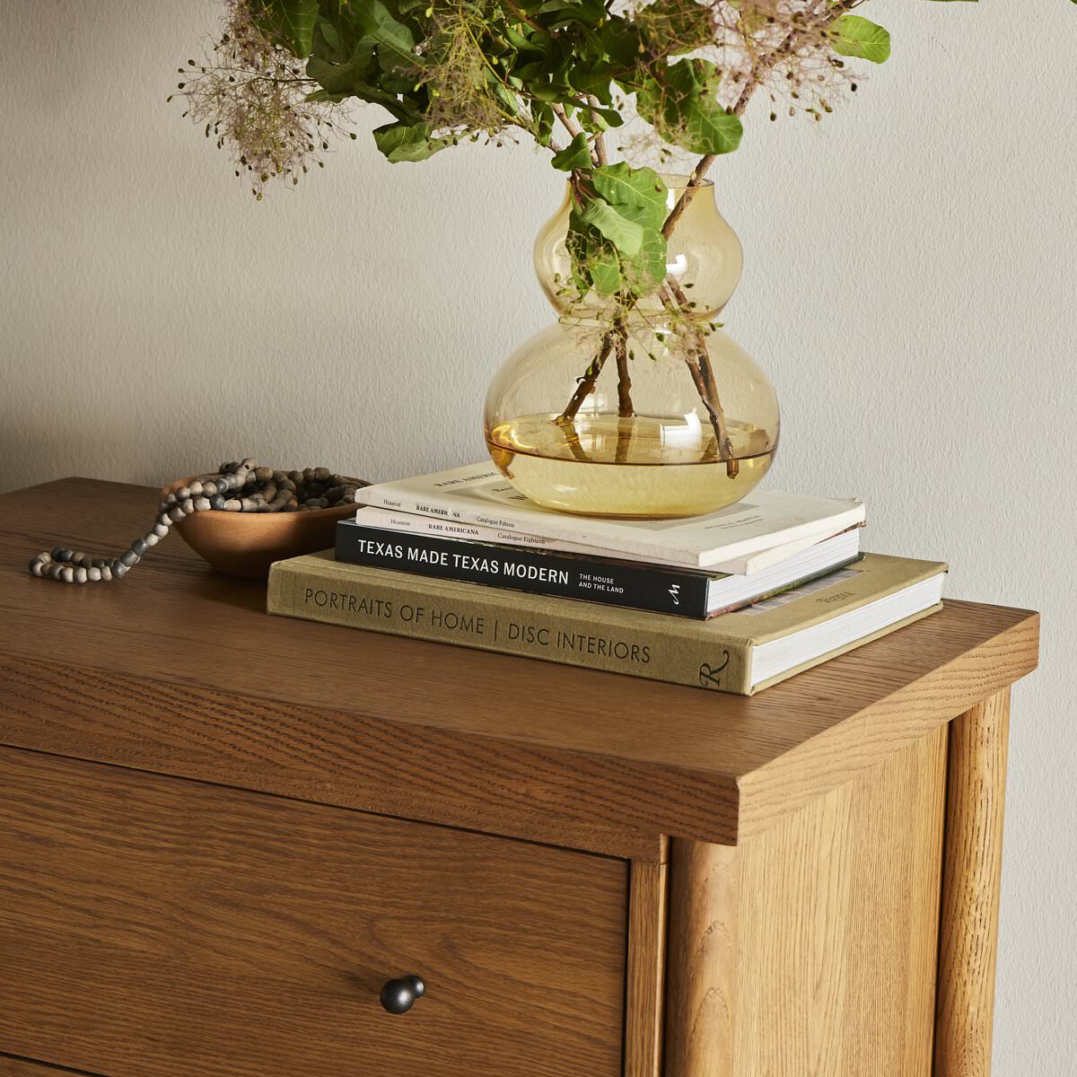 Close up of Four Hands Roark Nightstand in a modern neutral bedroom