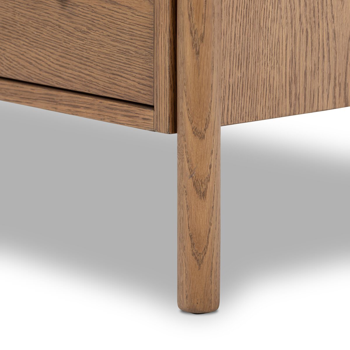 Close up of leg of Four Hands Roark Nightstand on a white background