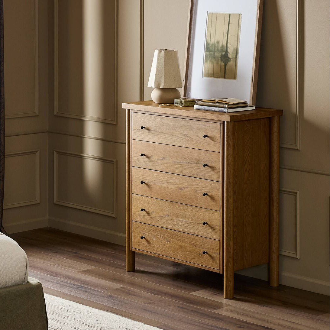 Four Hands Roark Tall Dresser in Amber Oak in a bedroom at Addison West