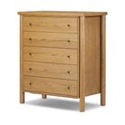 Four Hands Roark Tall Dresser in Amber Oak on a white background at Addison West