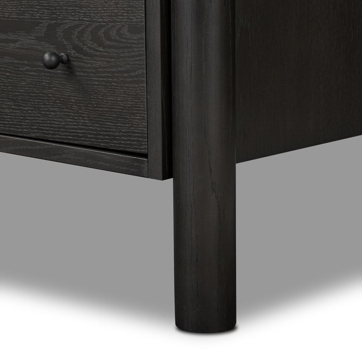 Close up of Four Hands Roark Tall Dresser in Ebony Oak Veneer  at Addison West
