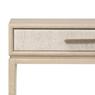 Close up of Four Hands Rosenell Console Table 60" in Natural Oak Solid on a white background at Addison West