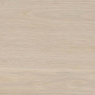 Close up of Four Hands Rosenell Console Table 60" in Natural Oak Solid on a white background at Addison West