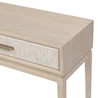 Close up of Four Hands Rosenell Console Table 60" in Natural Oak Solid on a white background at Addison West