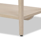 Close up of Four Hands Rosenell Console Table 60" in Natural Oak Solid on a white background at Addison West