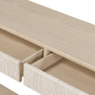 Close up of Four Hands Rosenell Console Table 60" in Natural Oak Solid on a white background at Addison West