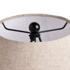 Close up of Four Hands Russo Table Lamp in Aged Black Terracotta on a white background at Addison West