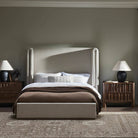 Four Hands Russo Table Lamp in Aged Black Terracotta on a nightstand at Addison West