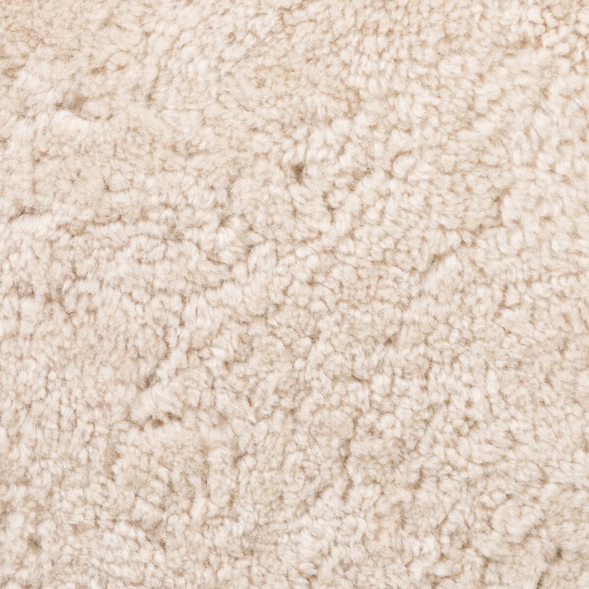 Close up of Four Hands Saldino Counter Stool in Beige Shearling on a white background at Addison West