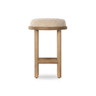 Four Hands Saldino Counter Stool in Beige Shearling on a white background at Addison West