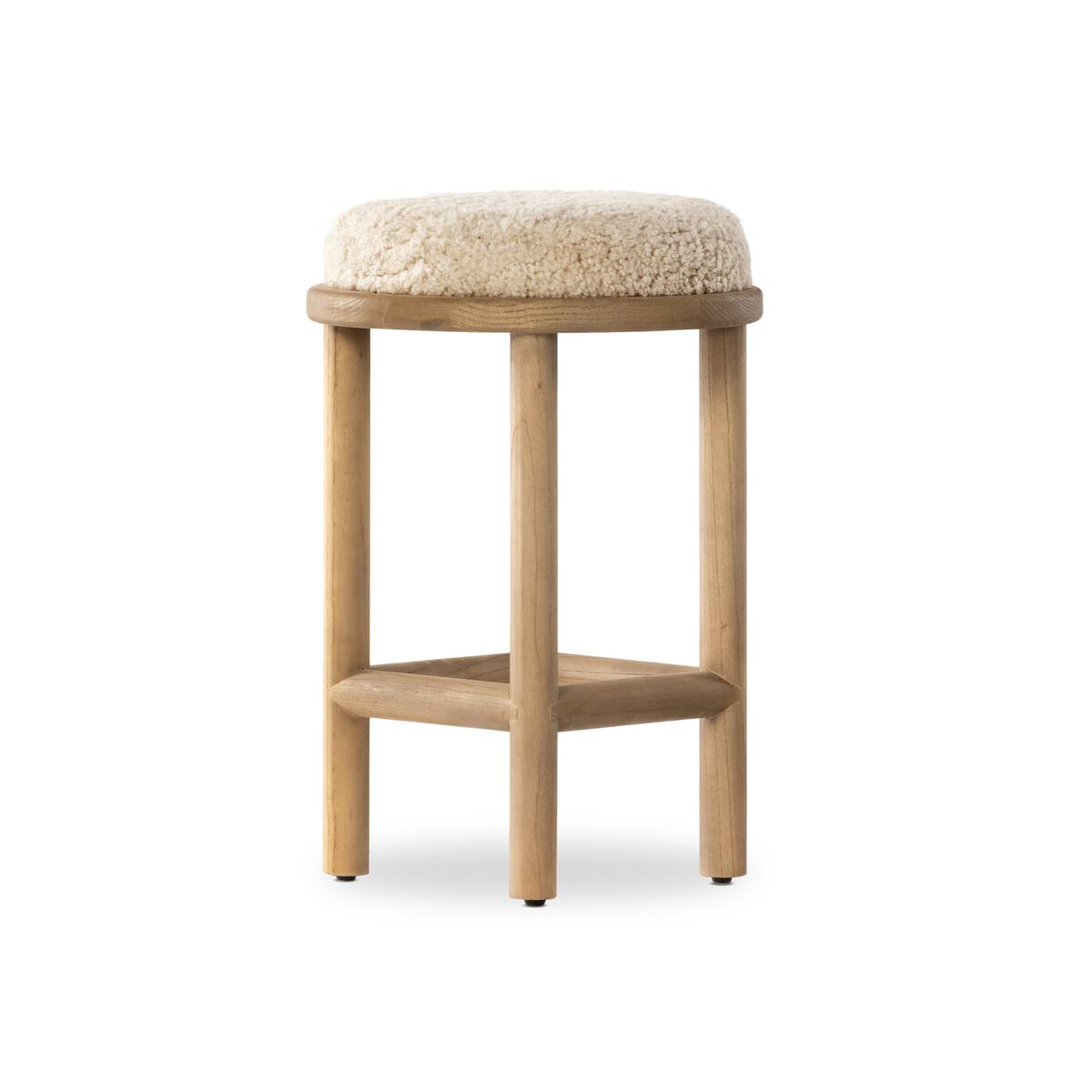 Four Hands Saldino Counter Stool in Beige Shearling on a white background at Addison West